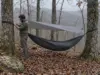 Hammock Camping Is Great Until It Isn’t Hammock camping setup hanging between two oaks in Pisgah National Forest on an overcast morning