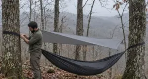 Hammock Camping Is Great Until It Isn’t Hammock camping setup hanging between two oaks in Pisgah National Forest on an overcast morning