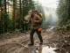 Steel Toe Hiking Boots Field-Tested for Trail Use Construction worker hiking a rocky logging trail in KEEN Utility steel toe boots at dawn