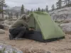 Great Backpacking Tents Sized the Way Pros Buy Two-person backpacking tent pitched on granite in the Sierra Nevada under flat overcast light