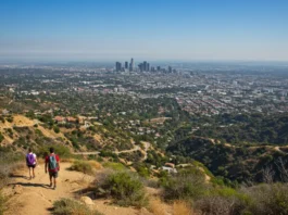 Panoramic view of Los Angeles hiking trails with hikers enjoying scenic urban and natural landscapes.