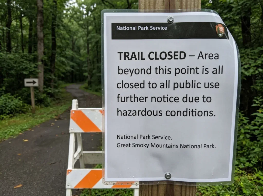 National Park Service trail closure notice posted at a Great Smoky Mountains trailhead