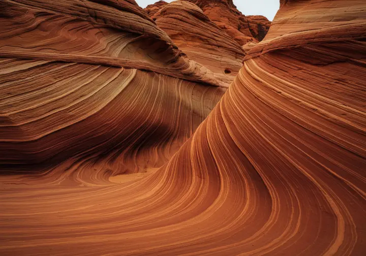 Detailed photograph of Aztec sandstone formations in Valley of Fire, showcasing textures and red coloration.