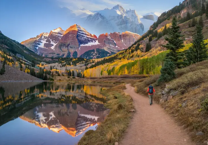 A panoramic view featuring iconic Colorado hiking destinations like Maroon Bells and Rocky Mountain National Park, representing a collection of detailed destination information.