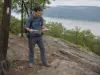 Cold Spring NY Hiking With Breakneck Still Closed Hiker checking a paper map on the Bull Hill trail above the Hudson River, hiking in Cold Spring NY