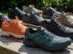 2025’s Best Backpacking Trail Runners: Expert Reviews Collection of 2025's best backpacking trail running shoes arranged outdoors in natural daylight.