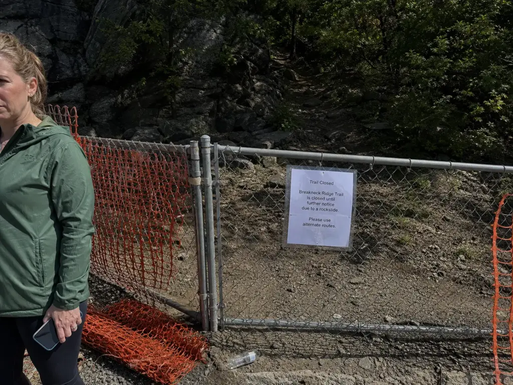 Closed Breakneck Ridge trailhead fencing on Route 9D near Cold Spring, New York