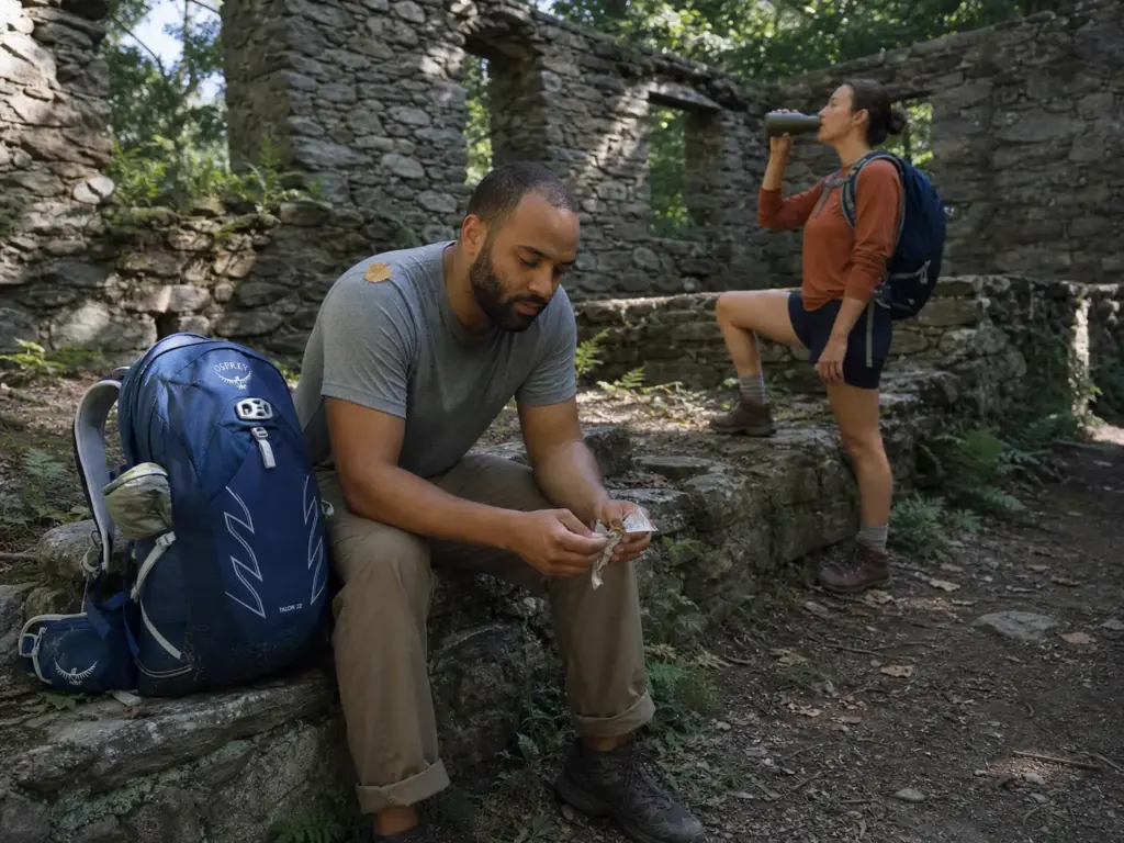 Hikers resting at the Cornish Estate ruins on an easier Cold Spring NY hiking trail