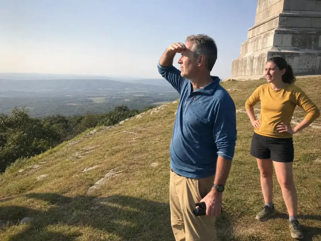 Hikers at the High Point Monument overlook on a North Jersey skyline view hike