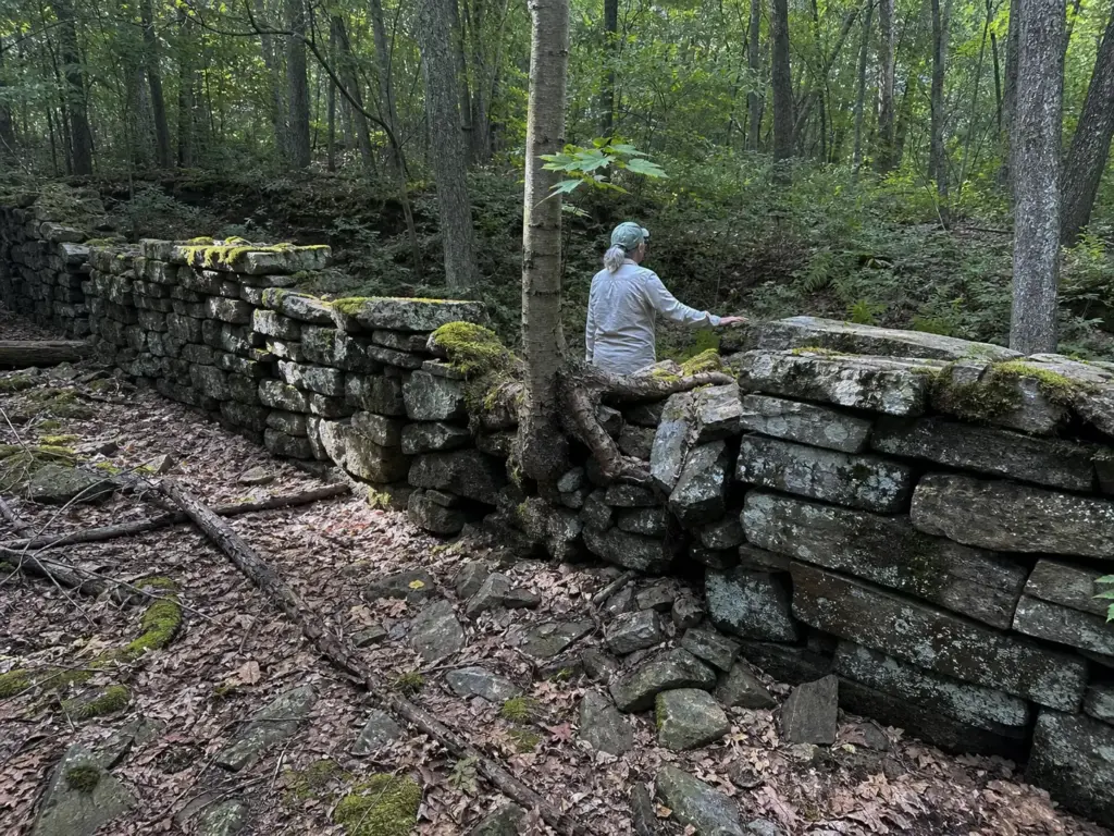 Moss-covered stone furnace ruins from the Sterling Iron Works in Sterling Forest State Park