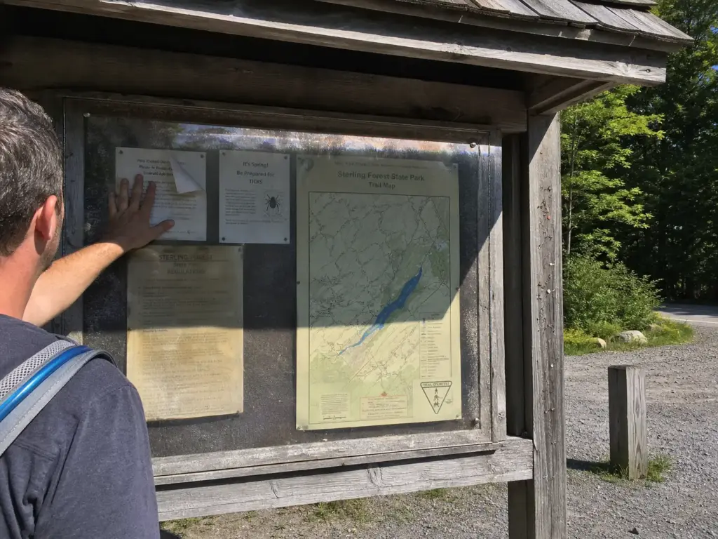 Trailhead kiosk with posted notices at Sterling Forest State Park in New York