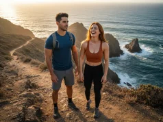 World’s Best Coastal Hikes: Difficulty & Scenery Guide An attractive man and woman in athletic gear hiking on a scenic coastal cliff path at sunset.