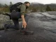 Approach Shoes vs Hiking Shoes Which Wins Where Hiker in approach shoes stepping onto a wet granite slab where the dirt trail ends