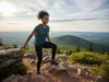 The Science of 4-Way Stretch in Performance Hiking Gear An athletic woman in 4-way stretch leggings scrambling up a rocky trail, demonstrating the fabric's flexibility.