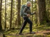 Can Seniors Hike Safely? Yes—Here’s the Fitness Plan Senior woman hiking forest trail with trekking poles and lightweight backpack