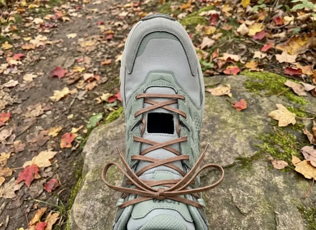 Window lacing technique on hiking boot showing pressure relief zone over instep