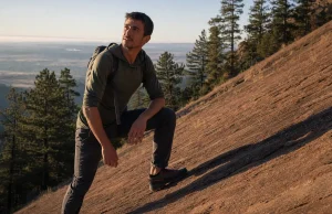 Best Approach Shoes for Scrambling Without a Shoe Swap Hiker in approach shoes pausing at the base of a Flatirons sandstone slab before scrambling