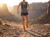 Ankle Gaiters Ranked After 500 Miles on the Trail Trail runner wearing Kahtoola ankle gaiters on rocky desert singletrack — best ankle gaiters for trail running