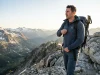 I Hiked in 9 Breathable Softshells and 3 Won Hiker in Arc'teryx softshell jacket standing on alpine ridge — best breathable softshell jackets for hiking tested