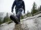 Which Rubber Grips Wet Rock? I Tested 12 Compounds Hiker testing outsole grip on wet granite rock in misty Cascade mountains