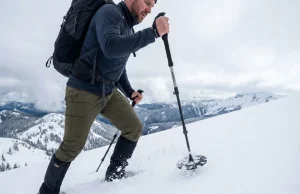 We Tested Every Trekking Pole Basket in Deep Snow Hiker using wide trekking pole snow baskets on deep powder alpine slope
