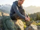 7 Wide Toe Box Boots I’d Actually Hike In Again Hiker lacing wide toe box Topo Athletic Trailventure 2 boots on alpine granite overlook