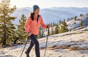 Trekking Pole Cadence That Cuts Fatigue 21% Woman hiking Sierra Nevada trail with proper trekking pole cadence rhythm