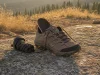 Gore-Tex vs Mesh Hiking Shoes The Breathability Cost Mesh hiking shoe drying on a rock at dusk, illustrating the Gore-Tex breathability trade-off