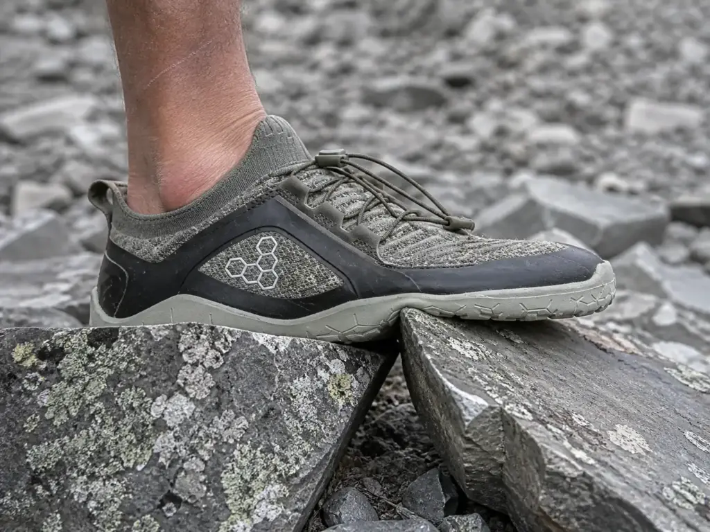 Thin-soled hiking shoe on sharp angular talus rock