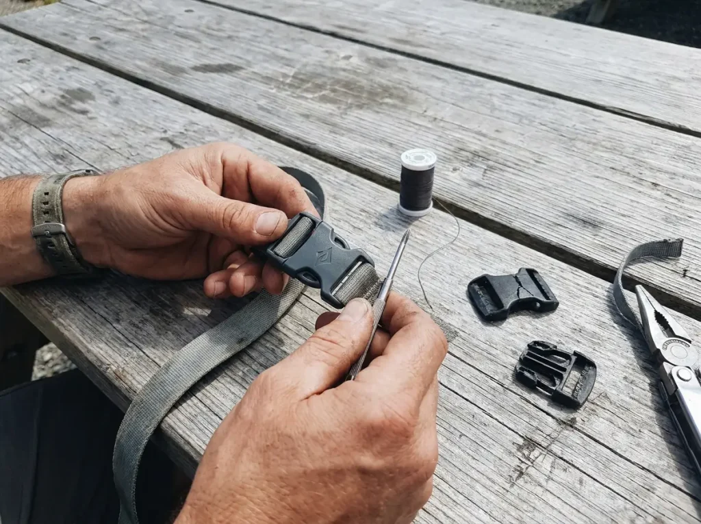 Replacing a snapped backpack buckle with a Sea to Summit Field Repair Buckle using a small screwdriver