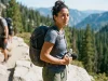 7 Trail Photography Rules to Respect Other Hikers Hiker practicing photography ethics on trail by yielding to others