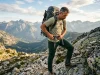 Stop Your Hiking Pants Falling Down Under a Pack Backpacker adjusting hip belt to stop hiking pants falling down under a pack