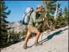 Best Ultralight Backpacks Really Under 2 Pounds Hiker on a granite trail wearing an Osprey Exos Pro 55 ultralight backpack at golden hour