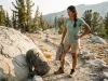 Zip Off Pants vs Roll Up After 500 Trail Miles Hiker comparing zip off pants and roll up pants on a dusty mountain trail