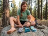 After 2,000 Miles I Carry Exactly This Many Socks Thru-hiker laying out three pairs of hiking socks on a flat rock at camp