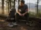 Trail Runners vs Hiking Boots What Pack Weight Decides Trail runners and hiking boots side by side at a campsite, the backpacking footwear decision