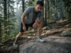 Zero-Drop Trail Shoes Explained for Runners Zero-drop trail shoes on a runner mid-stride on rocky singletrack, level heel and forefoot visible