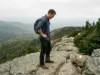 Best Hikes in Vermont Sorted by Type of Hard Hiker on the rocky Long Trail ridge below Mount Mansfield, one of the best hikes in Vermont