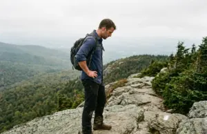 Best Hikes in Vermont Sorted by Type of Hard Hiker on the rocky Long Trail ridge below Mount Mansfield, one of the best hikes in Vermont